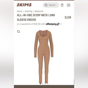 SKIMS all in one scoop neck long sleeve onesie in UMBER